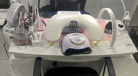 Nail station setup at Nails by Juliette, Melbourne, Victoria, AU, featuring tools and UV lamp.