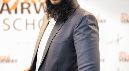 Close-up of a person in a stylish suit at Ashfaq Hair Studio, Beau Bassin-rose Hill, Plaines Wilhems District, MU.