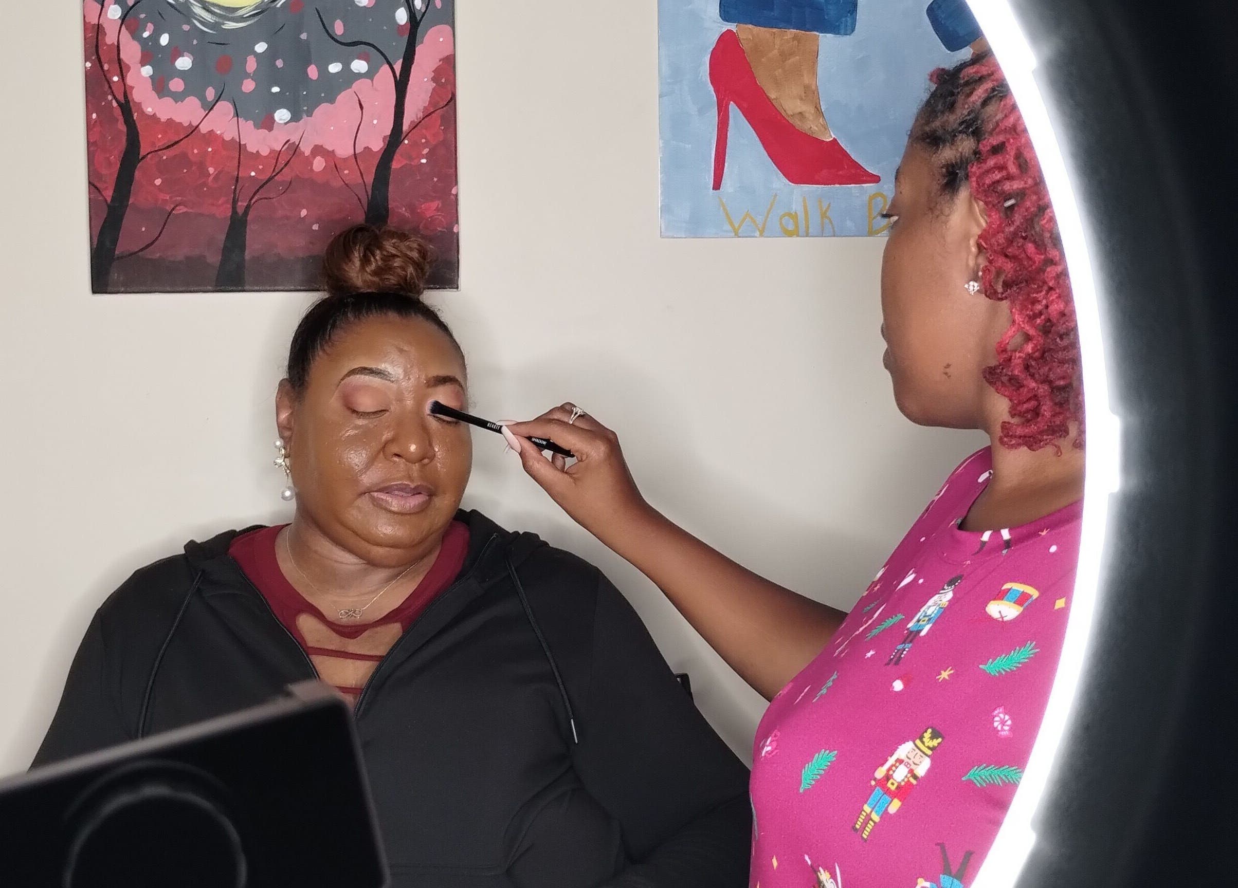 Makeup artist at Unapologetically R. Nicole | Luxe Makeup in Fultondale, Alabama, applying makeup on a client.