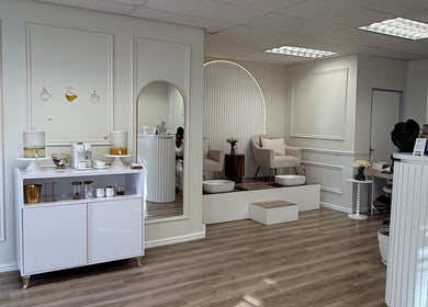 Chic and serene interior of Elite Spa and Beauty in Cape Town, Western Cape, ZA showcasing plush seating and decor.
