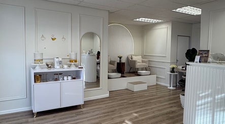 Chic and serene interior of Elite Spa and Beauty in Cape Town, Western Cape, ZA showcasing plush seating and decor.