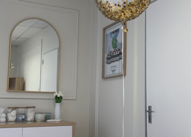 Chic interior of Elite Spa and Beauty in Cape Town, Western Cape, ZA with mirrors and decorative items.