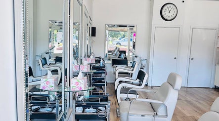 Stylish and modern salon chairs and mirrors at Jo Beauty Experts, Melbourne, Victoria, AU.