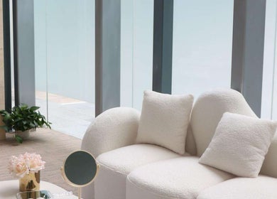 Inviting lounge area at HMD Beauty Center in Kuala Lumpur, featuring plush seating and elegant decor.