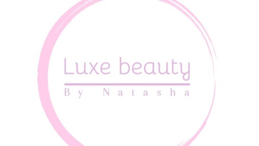 Elegant logo of Luxe Beauty By Natasha Perry in Rossendale, England, GB, showcased in soft pink hues.