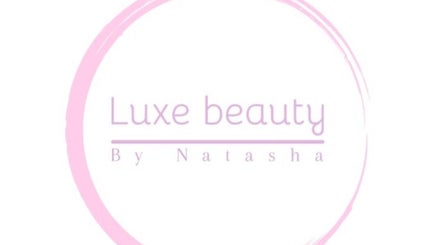 Elegant logo of Luxe Beauty By Natasha Perry in Rossendale, England, GB, showcased in soft pink hues.