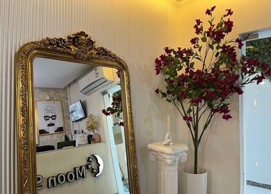 Ornate mirror and floral decor at Moon Spa in Dammam, Eastern Province, SA, creating a luxurious ambiance.