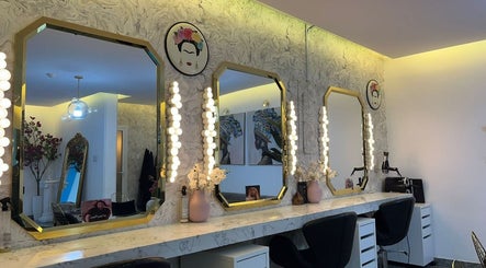 Elegant vanity mirrors with lighting at Moon Spa, Dammam, Eastern Province, SA. Chic and modern ambiance.