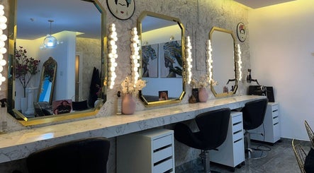 Elegant vanity mirrors at Moon Spa, Dammam, Eastern Province, SA feature modern decor and lush lighting.