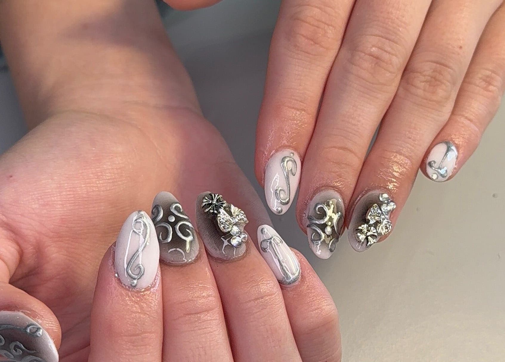 Elegant nail art with gems and patterns by CLAWS BY KRIS in Cape Town, Western Cape, ZA.