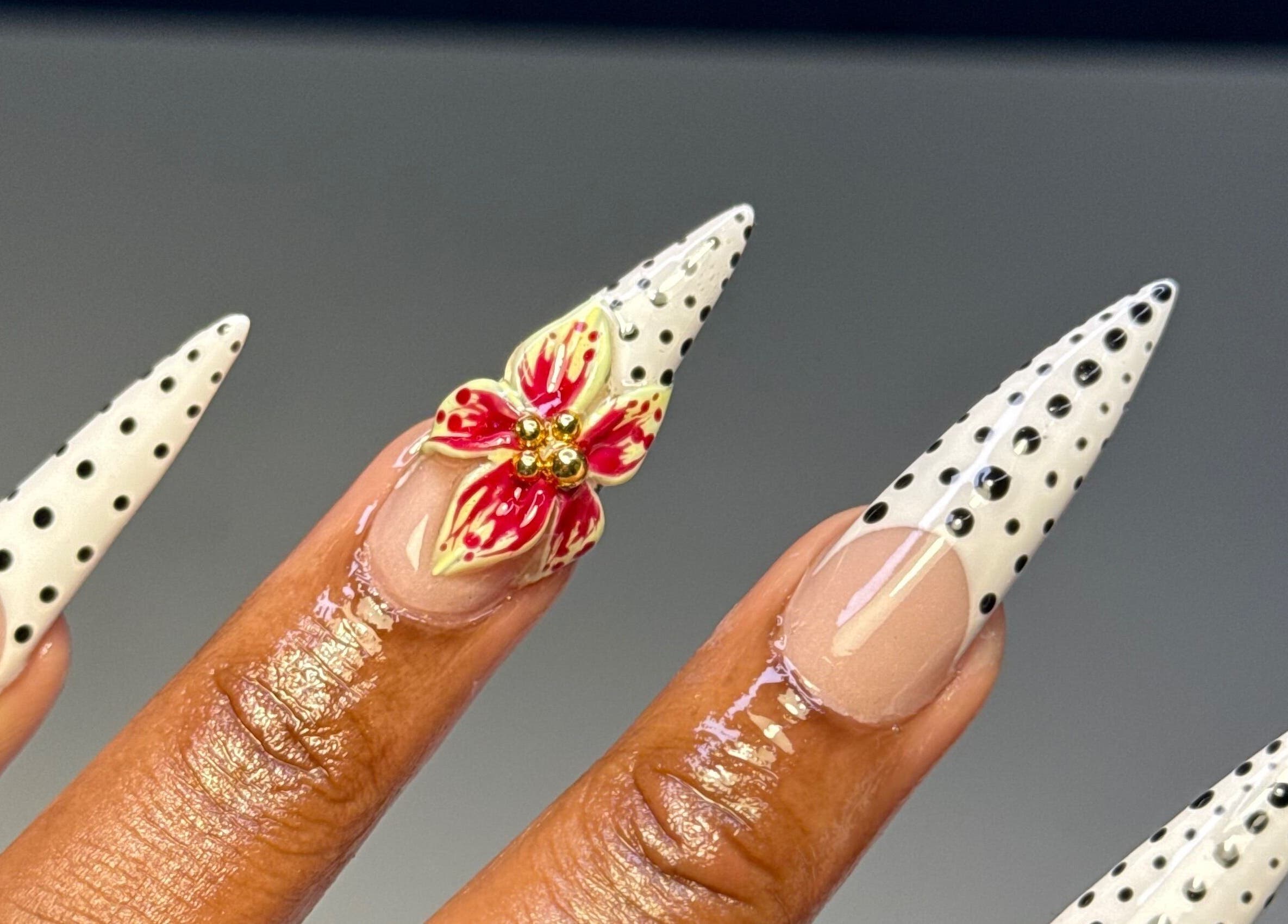 Elegant floral and polka dot nail art at CLAWS BY KRIS, Cape Town, Western Cape, ZA.