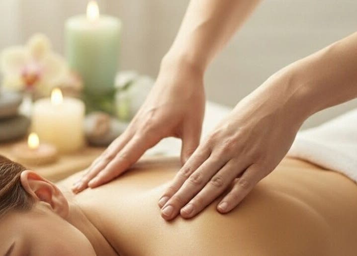 Relaxing massage at HomeHavenMassage in Morisset, New South Wales, AU with soothing candles and stones.