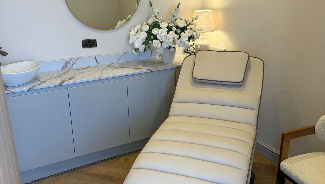 Elegant treatment room at Peak Wellness Health and Medispa, Dronfield, England, GB, featuring a plush spa bed.