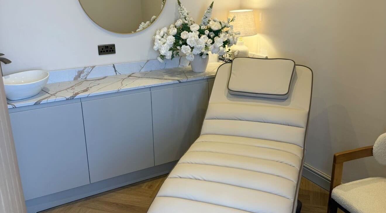 Elegant treatment room at Peak Wellness Health and Medispa, Dronfield, England, GB, featuring a plush spa bed.