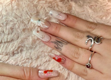 Elegant nail art with floral designs at The Nail Nest by Shannen in Limerick, County Limerick, IE.