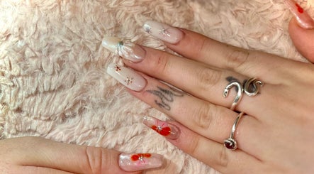 Elegant nail art with floral designs at The Nail Nest by Shannen in Limerick, County Limerick, IE.