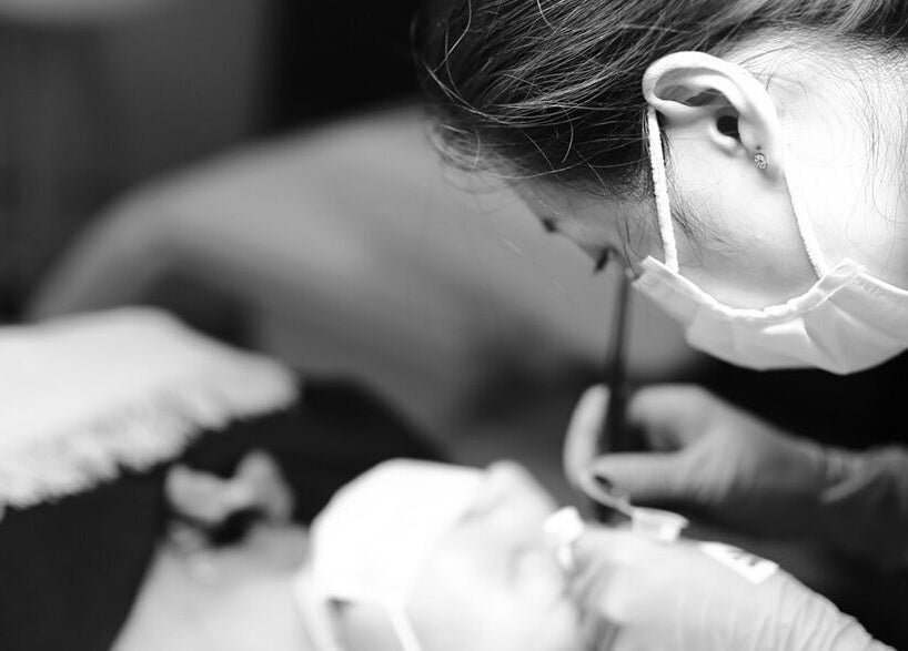 Aesthetic technician perfecting beauty treatment at Thy Beauty Studio, Solihull, England, GB.
