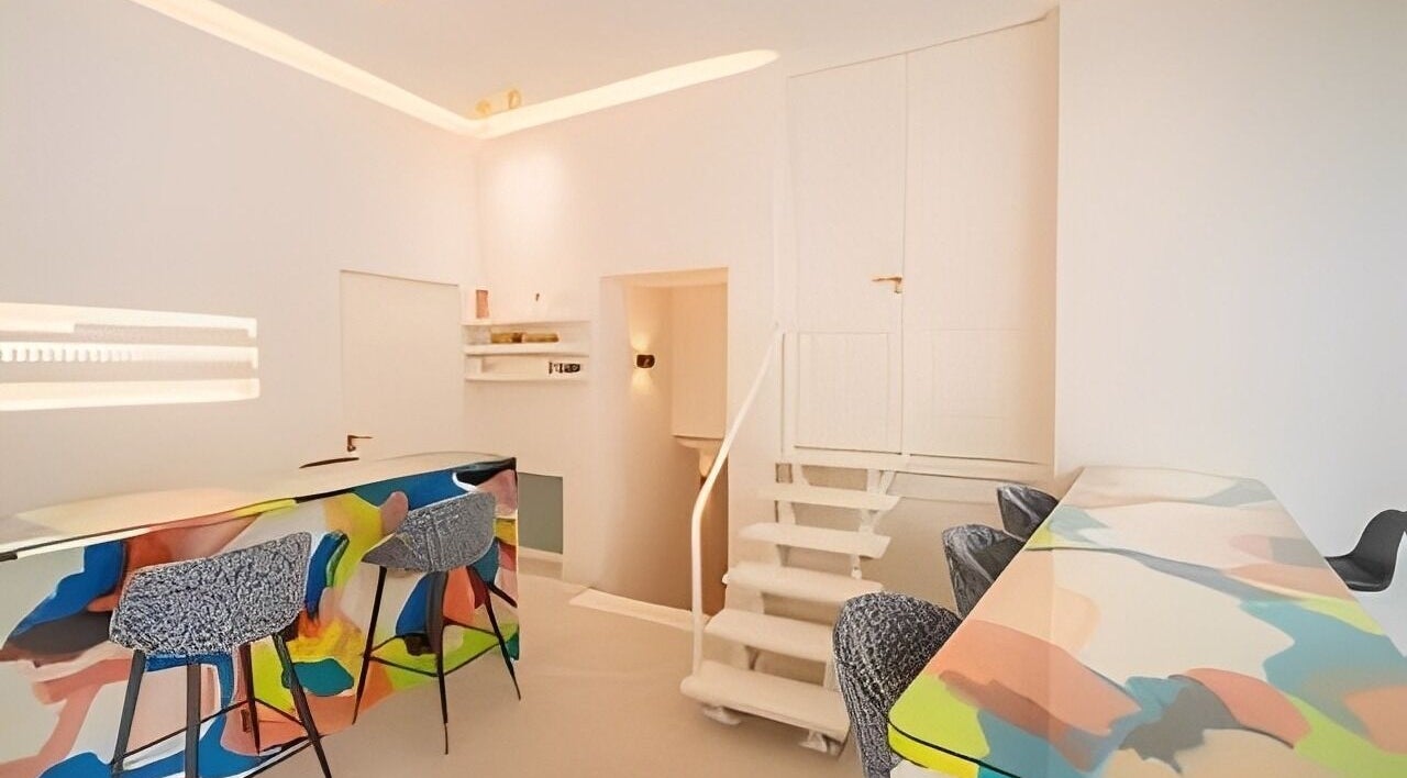 Contemporary artistic space at Artist Lab, Amsterdam, Noord-Holland, NL, featuring colorful bar and modern design.