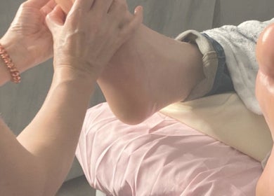 Foot massage therapy at Holistic Reflexology & Massage, Brentwood, England, GB. Relaxation and wellness.