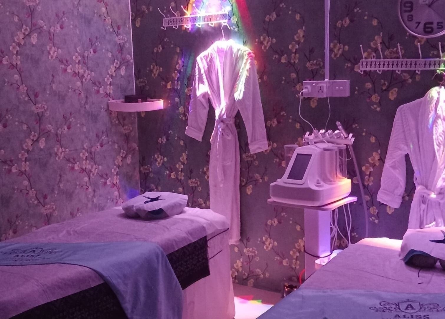 Calming spa room at Aliss Salon Beauty Spa, Kuah, Kedah, MY with cozy robes and treatment beds.