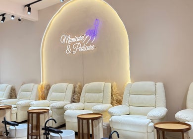 Elegant white lounge chairs at De Boss Hair & Nail Saloon, Johor Bahru, Johor Darul Ta'zim, MY.