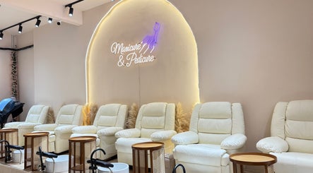 Elegant white lounge chairs at De Boss Hair & Nail Saloon, Johor Bahru, Johor Darul Ta'zim, MY.