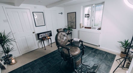 Cozy interior of Solo Chair at Royal Leamington Spa, England, features vintage barber chair and modern decor.