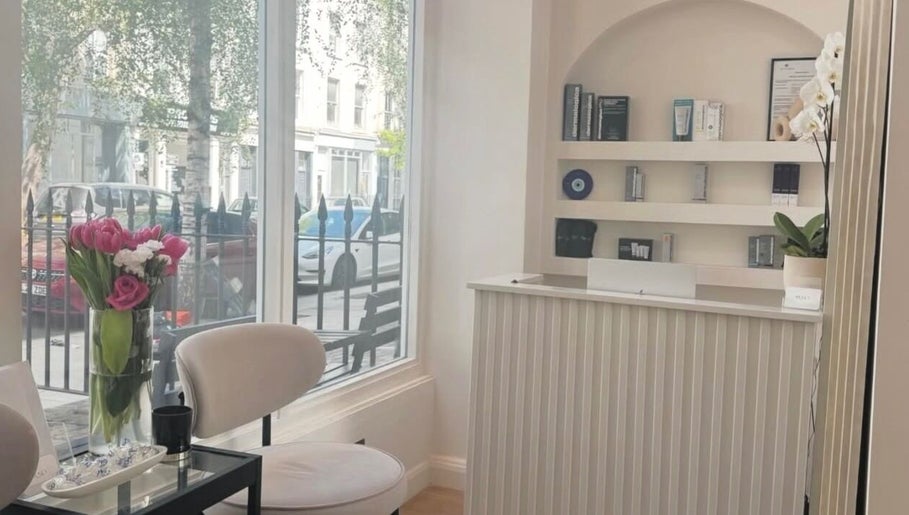 Welcoming reception at Reset Beauty, London, England featuring elegant decor and a bright window view.