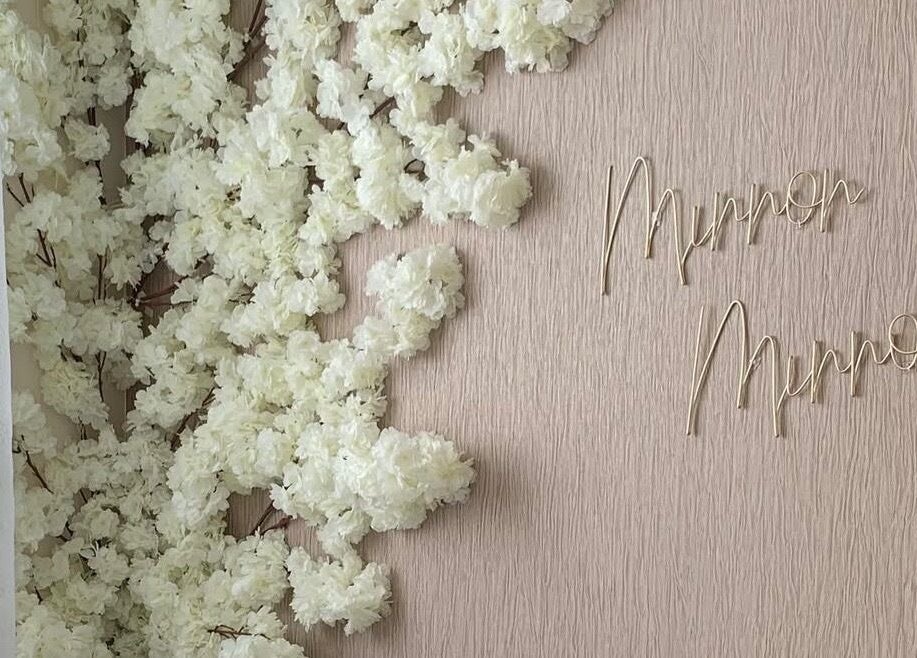 Floral decor with 'Mirror Mirror' text at Ash Fern Tattoo, Romford, England, GB.