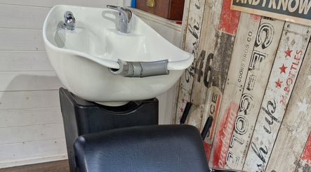 Washing station at The Garden Salon Hair Design, Colchester, England, GB, offering comfort and style.