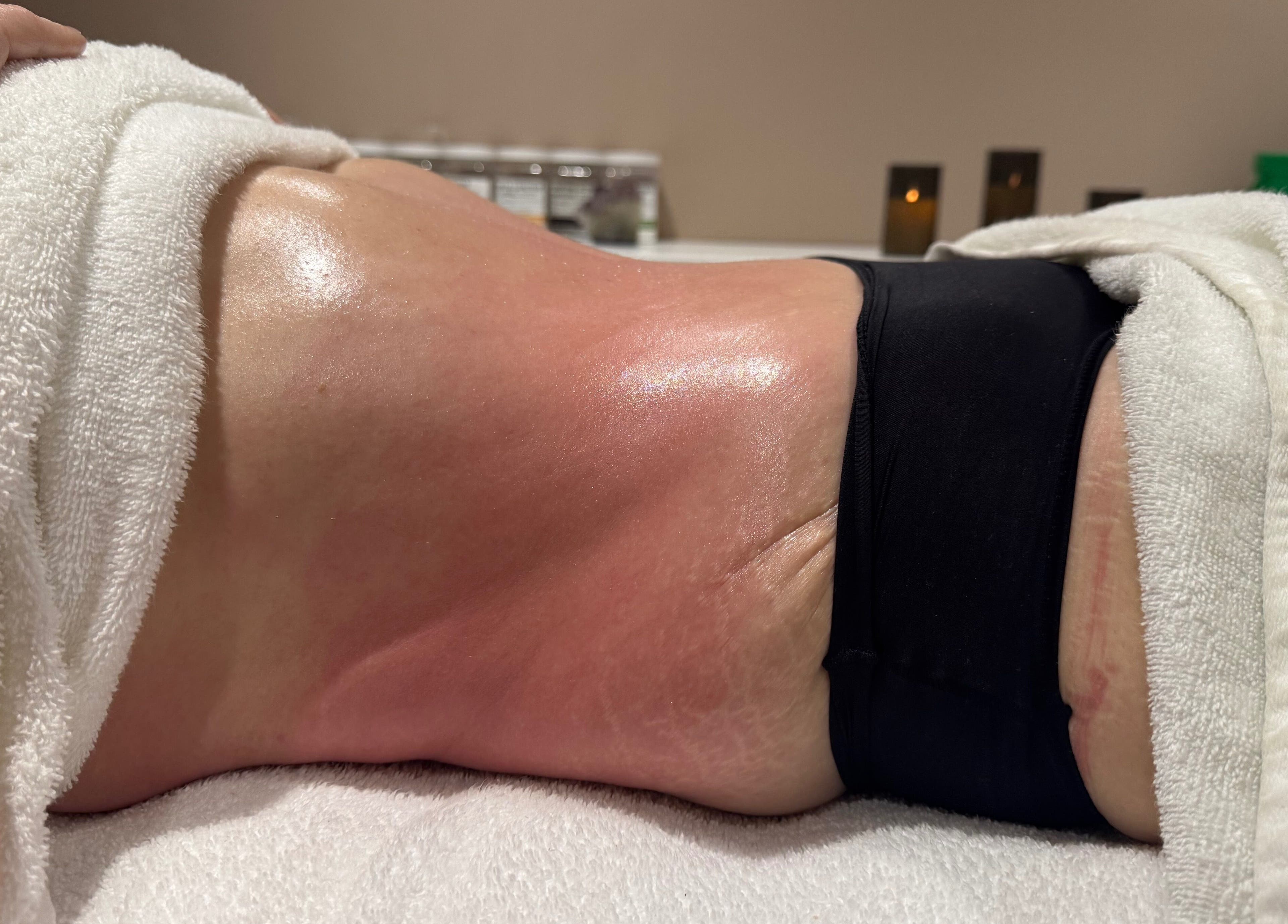 Relaxing back treatment at Face and Body Haus by Mara, London, England, GB for glowing skin. Soft lighting.