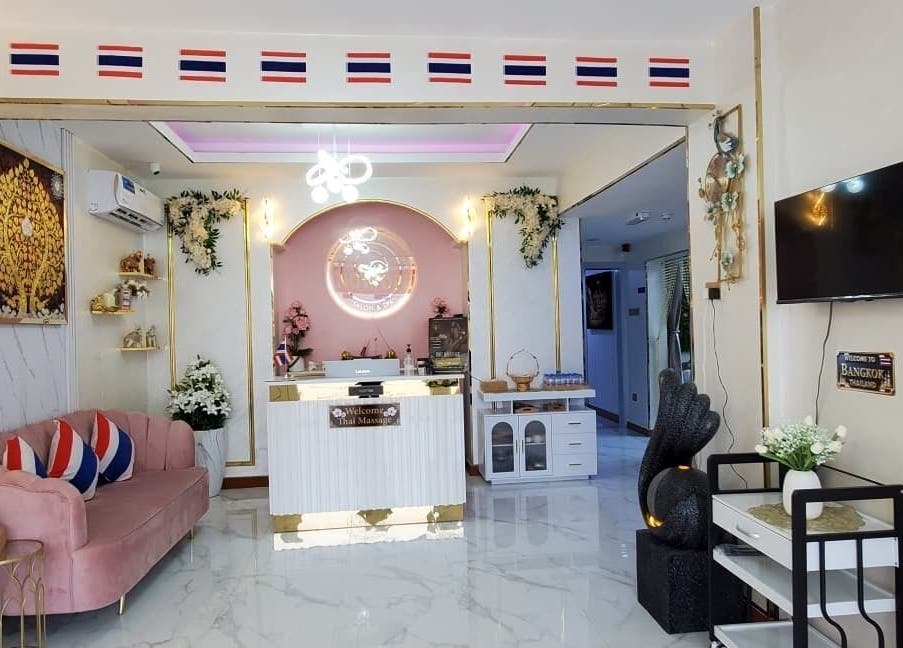 Reception area of Modiva Spa and Wellness in Al Ain, Abu Dhabi, AE, featuring elegant decor and seating.