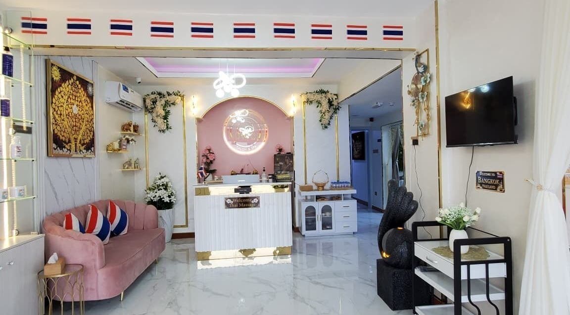 Reception area of Modiva Spa and Wellness in Al Ain, Abu Dhabi, AE, featuring elegant decor and seating.