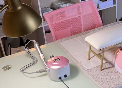 Nail care setup at Perfectly Pressed Studio, Johannesburg, Gauteng, ZA with tools on sleek desk.