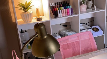 Elegant nail salon setup at Perfectly Pressed Studio, Johannesburg, Gauteng, ZA, featuring vibrant polish and decor.