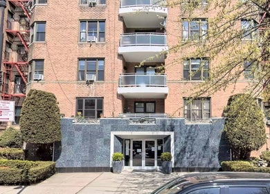Front entrance of Carmenglitz.inc in New York, New York, US, showcasing elegant architecture.