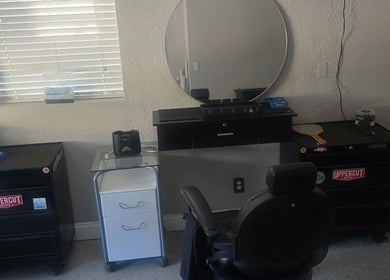 G.Y.M Grooming BarberSpa's stylish salon setup in St. Petersburg, Florida, US with modern decor and tools.