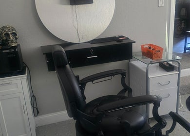 Sleek barber chair and styling station at G.Y.M Grooming BarberSpa, St. Petersburg, Florida, US.