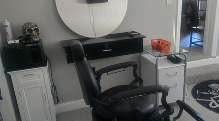 Sleek barber chair and styling station at G.Y.M Grooming BarberSpa, St. Petersburg, Florida, US.