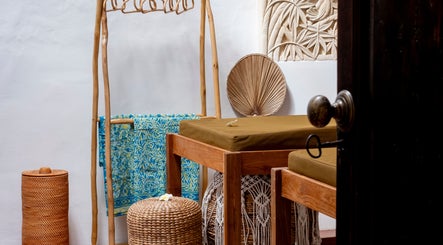 Serene relaxation room at Asia Spa Lanzarote in Teguise, Canarias, ES, featuring elegant wooden decor.