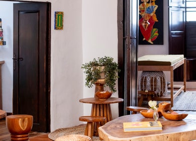 Elegant wellness room at Asia Spa Lanzarote in Teguise, Canarias, ES showcasing rustic wood décor.