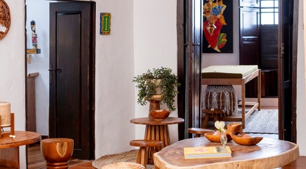 Elegant wellness room at Asia Spa Lanzarote in Teguise, Canarias, ES showcasing rustic wood décor.