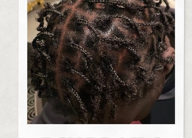 Close-up of intricate braids at Locked In Avenue, Melbourne, Victoria, AU.