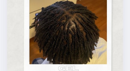 Intricate dreadlock style at Locked In Avenue, Melbourne, Victoria, AU.