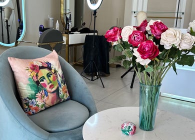 Decorative seating area with floral vase at Cateon Luxury, Pretoria, Gauteng, ZA.