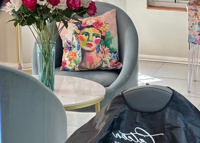 Chic seating area with colorful decor at Cateon Luxury, Pretoria, Gauteng, ZA, perfect for relaxation.