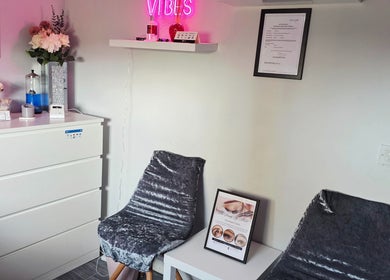 Chic Beauty By M.W reception area in Edinburgh, Scotland, GB with elegant decor and a warm ambiance.