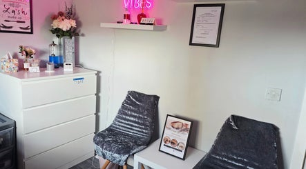 Chic Beauty By M.W reception area in Edinburgh, Scotland, GB with elegant decor and a warm ambiance.