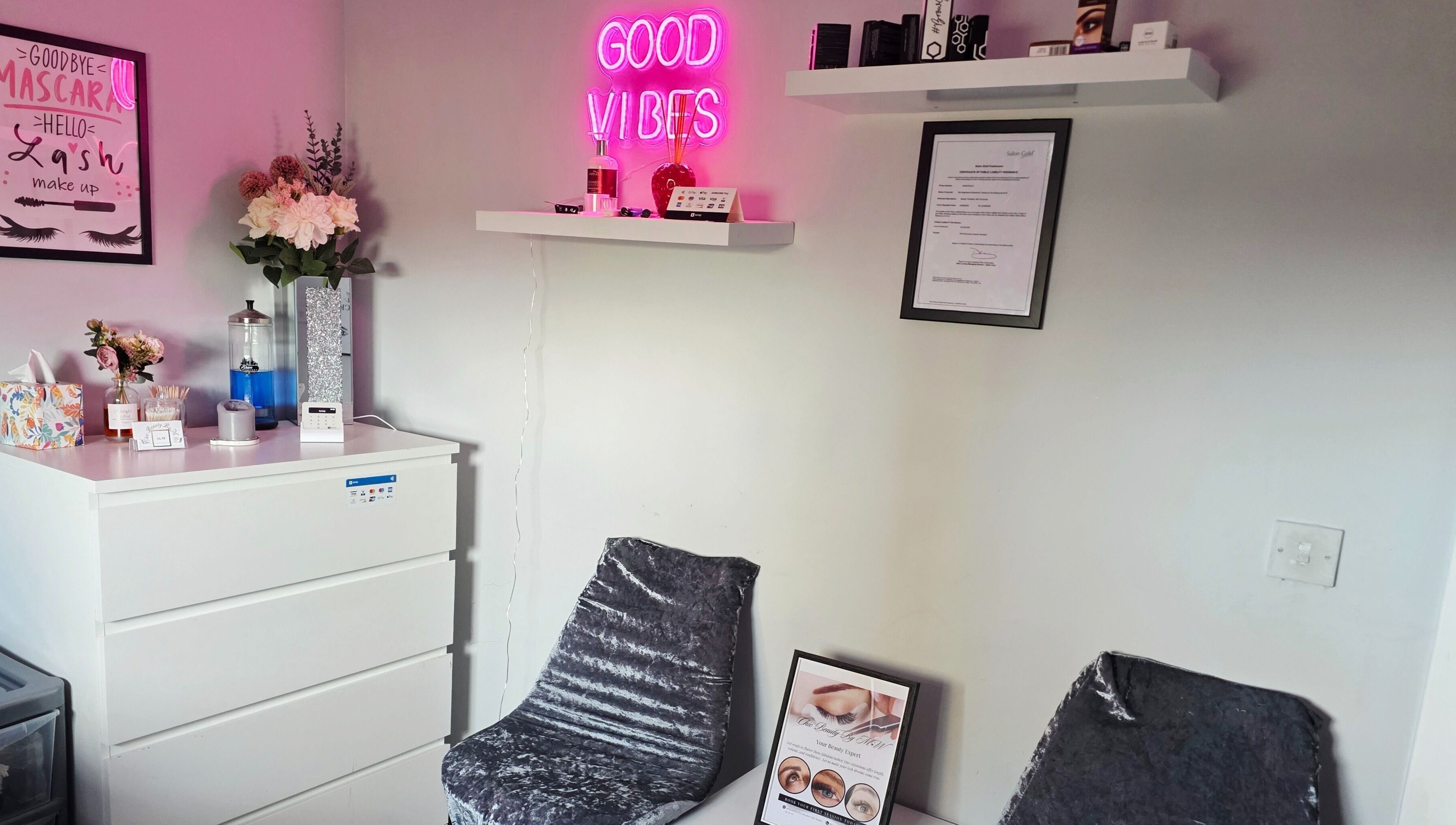 Cozy decor at Chic Beauty By M.W, Edinburgh, Scotland, GB with 'Good Vibes' neon sign.
