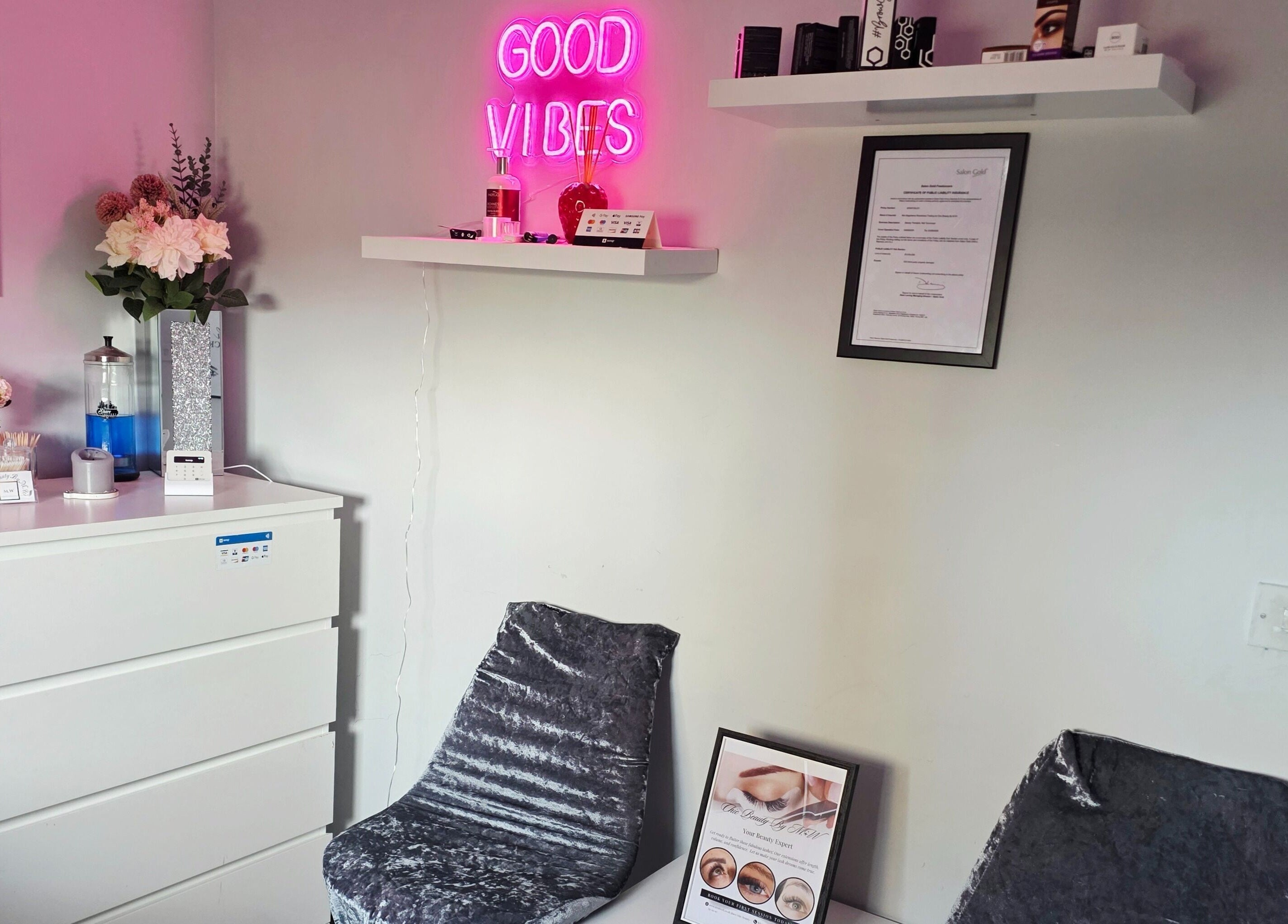 Cozy decor at Chic Beauty By M.W, Edinburgh, Scotland, GB with 'Good Vibes' neon sign.